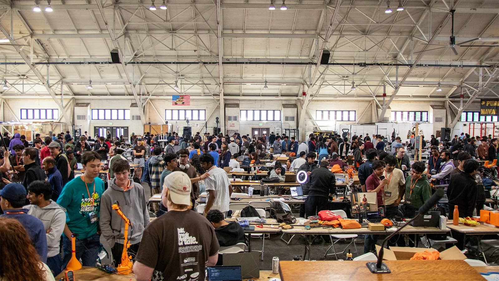Students fill the Purdue Armory while building and demonstrating hardware at StarkHacks