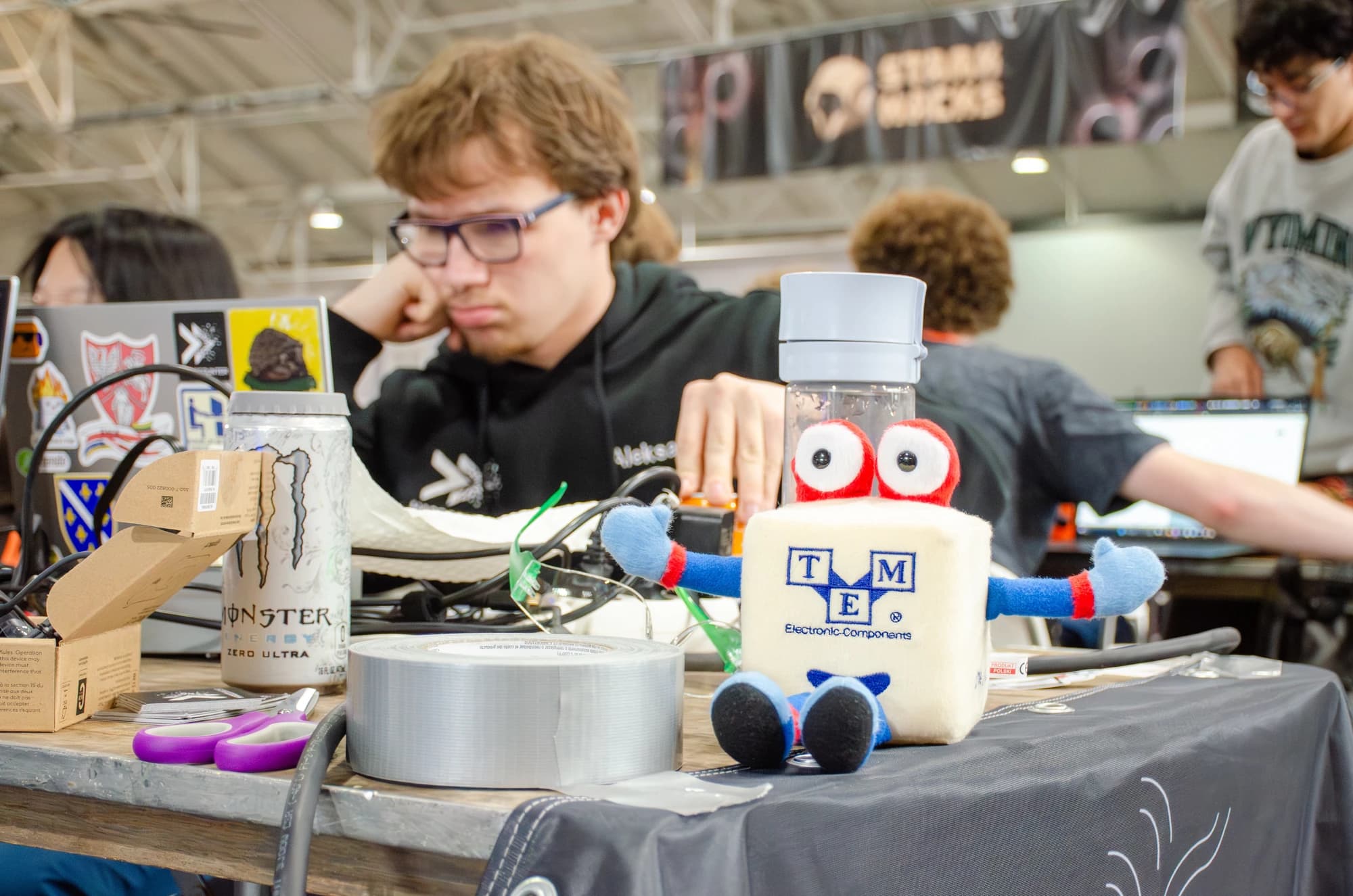 A participant working on a hardware project at StarkHacks