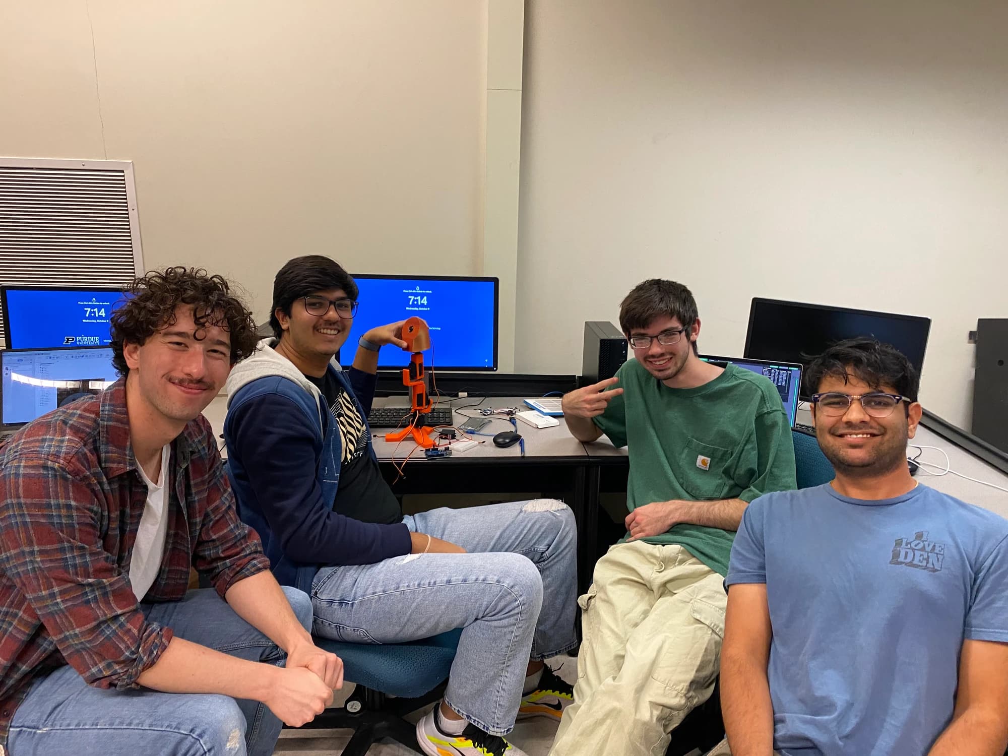 HRC software team members at their lab workstations